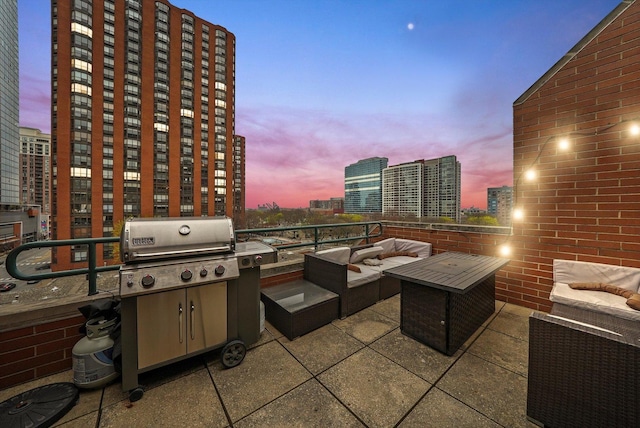 801 S Plymouth Ct Unit 602, Chicago, IL 60605 - view of patio featuring outdoor lounge area, a view of city, and grilling area