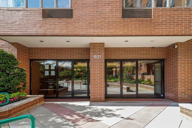 801 S Plymouth Ct Unit 602, Chicago, IL 60605 - property entrance with brick siding