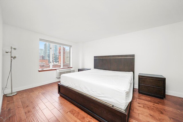 801 S Plymouth Ct Unit 602, Chicago, IL 60605 - bedroom with hardwood / wood-style flooring and a view of city
