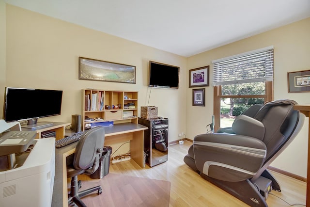 963 Monticello Dr, Naperville, IL 60563 - office area with light wood-style floors and baseboards