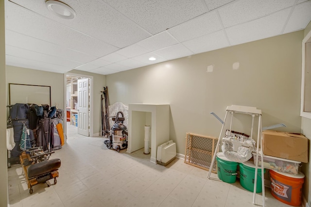 963 Monticello Dr, Naperville, IL 60563 - below grade area featuring a drop ceiling and tile patterned floors