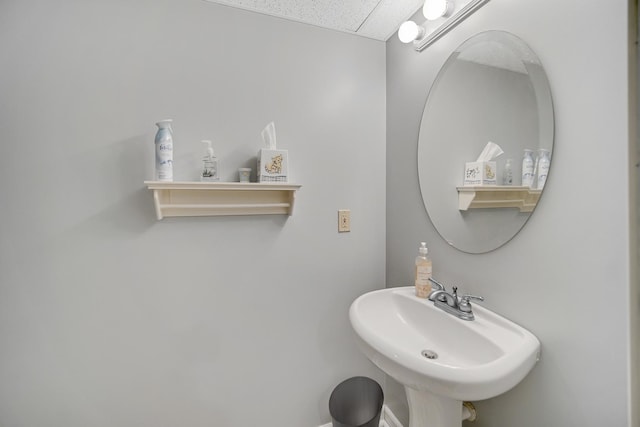 963 Monticello Dr, Naperville, IL 60563 - bathroom featuring a sink and a drop ceiling
