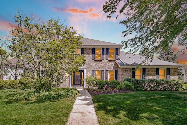 963 Monticello Dr, Naperville, IL 60563 - view of front of home featuring a front lawn, brick siding, and roof with shingles