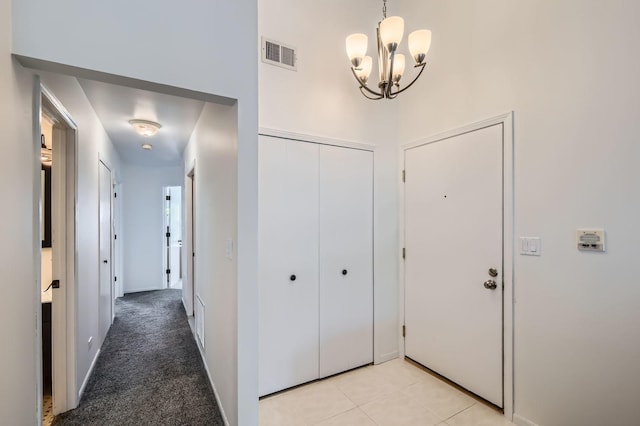 1240 Winfield Ct Unit 4, Roselle, IL 60172 - entryway with a chandelier and light colored carpet