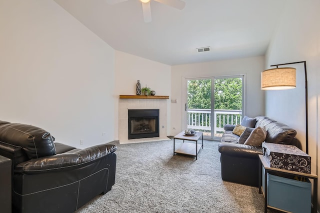 1240 Winfield Ct Unit 4, Roselle, IL 60172 - carpeted living area with a ceiling fan, vaulted ceiling, and a tiled fireplace