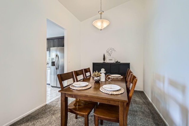 1240 Winfield Ct Unit 4, Roselle, IL 60172 - dining area featuring vaulted ceiling and light carpet