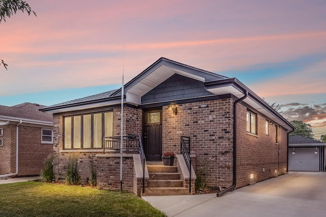 7644 W Norridge St, Norridge, IL 60706 - view of front of property with brick siding, concrete driveway, and a garage