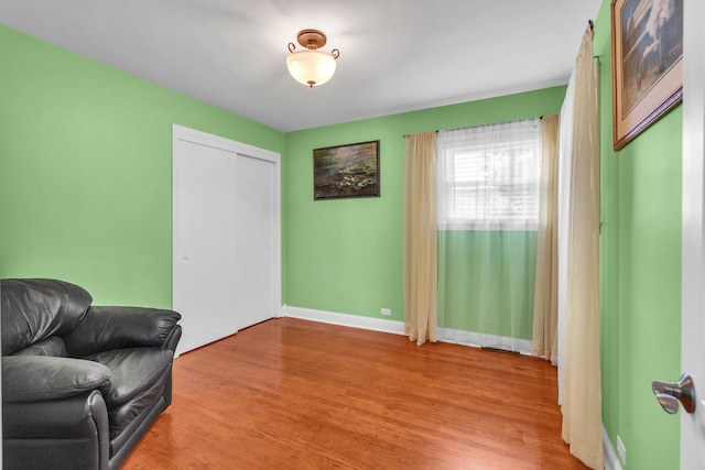 7644 W Norridge St, Norridge, IL 60706 - living area with light wood-style floors and baseboards