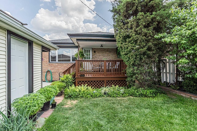 7644 W Norridge St, Norridge, IL 60706 - back of property featuring brick siding, a lawn, and a deck
