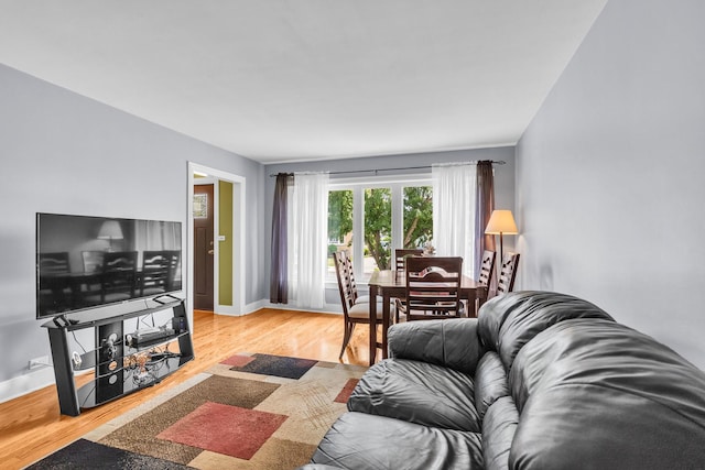 7644 W Norridge St, Norridge, IL 60706 - living room featuring light wood-style floors and baseboards