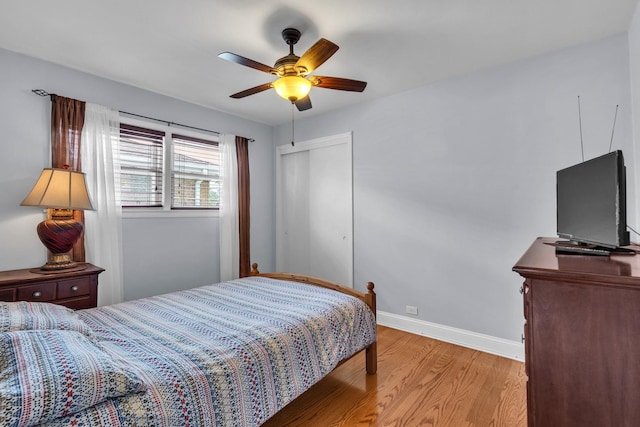 7644 W Norridge St, Norridge, IL 60706 - bedroom with light wood-style floors, a ceiling fan, and a closet
