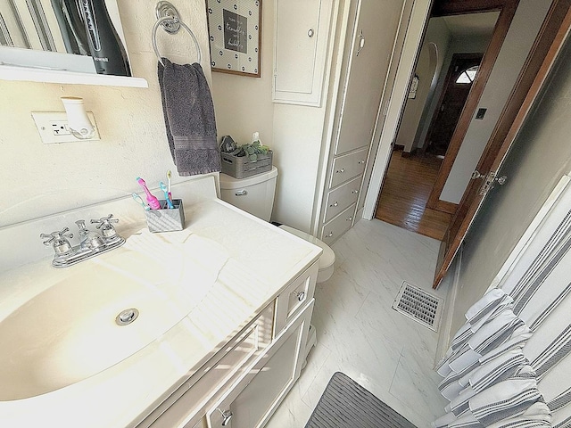 405 N Division Ave, Polo, IL 61064 - bathroom with marble finish flooring and vanity