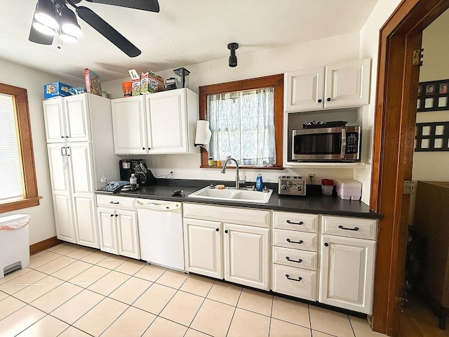 405 N Division Ave, Polo, IL 61064 - kitchen with dishwasher, stainless steel microwave, dark countertops, and ceiling fan