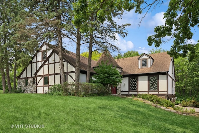 674 Plum Tree Rd, Barrington Hills, IL 60010 - view of front facade featuring a front yard, a shingled roof, and stone siding