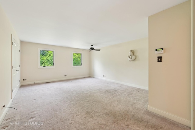 674 Plum Tree Rd, Barrington Hills, IL 60010 - carpeted empty room featuring a ceiling fan and baseboards