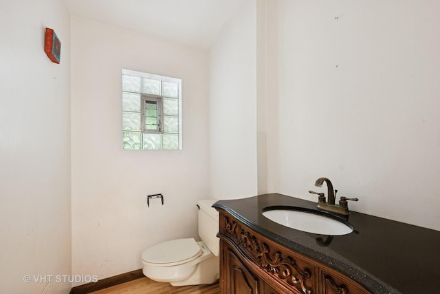 674 Plum Tree Rd, Barrington Hills, IL 60010 - half bathroom featuring vanity and wood finished floors