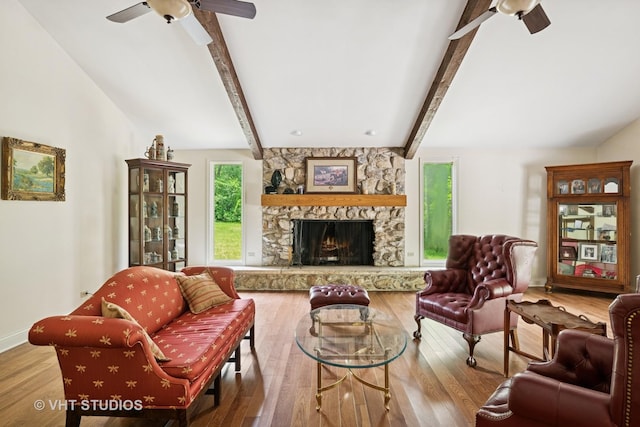 674 Plum Tree Rd, Barrington Hills, IL 60010 - living area featuring ceiling fan, beamed ceiling, a fireplace, and wood finished floors