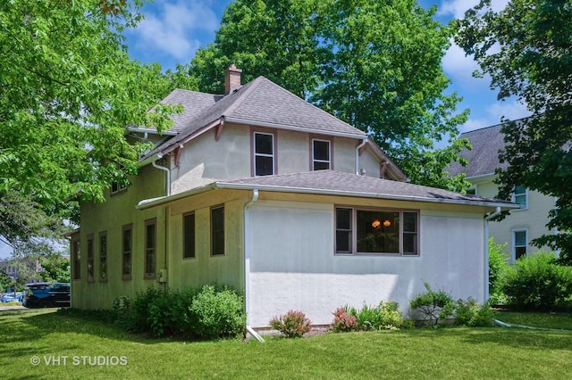 154 N Fremont St, Palatine, IL 60067 - view of side of home featuring stucco siding, a lawn, a chimney, and a shingled roof