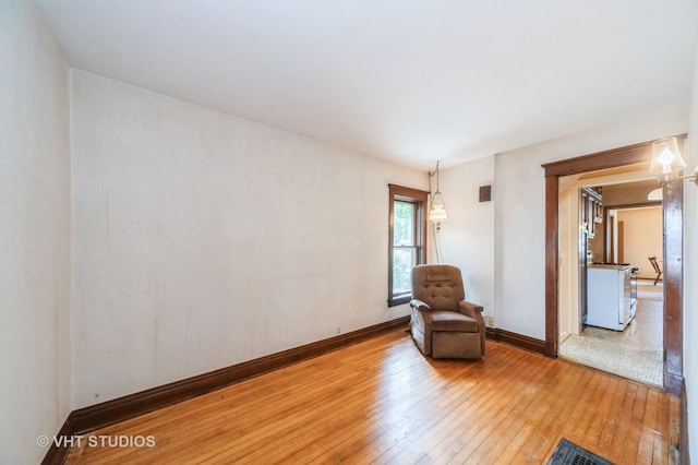 154 N Fremont St, Palatine, IL 60067 - living area with wood-type flooring and baseboards