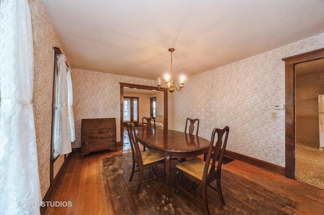 154 N Fremont St, Palatine, IL 60067 - dining room with hardwood / wood-style flooring, wallpapered walls, and a chandelier