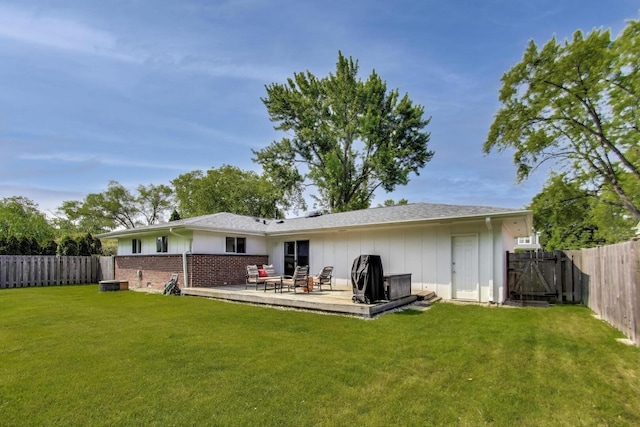 410 W Maude Ave, Arlington Heights, IL 60004 - rear view of house featuring a fenced backyard and brick siding