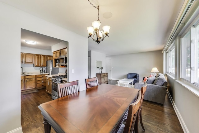 410 W Maude Ave, Arlington Heights, IL 60004 - dining room with a chandelier and dark wood-style floors