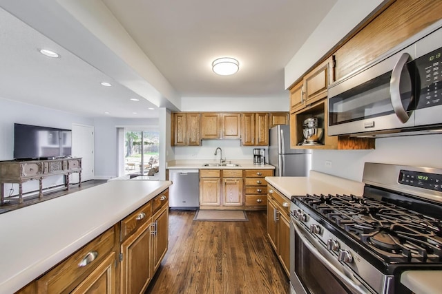 410 W Maude Ave, Arlington Heights, IL 60004 - kitchen featuring appliances with stainless steel finishes, light countertops, brown cabinets, dark wood-type flooring, and recessed lighting