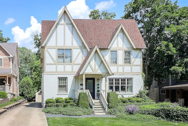 4907 Northcott Ave, Downers Grove, IL 60515 - tudor house featuring stucco siding and roof with shingles