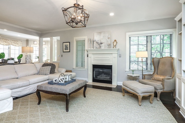 4907 Northcott Ave, Downers Grove, IL 60515 - living room featuring dark wood-type flooring, crown molding, a fireplace with flush hearth, ornate columns, and recessed lighting