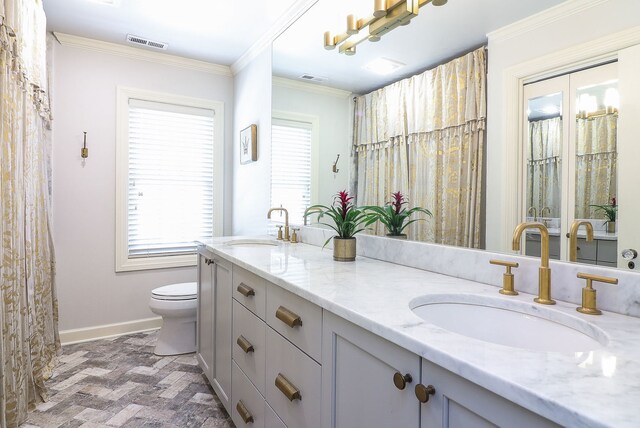 4907 Northcott Ave, Downers Grove, IL 60515 - bathroom with double vanity, crown molding, and brick floors
