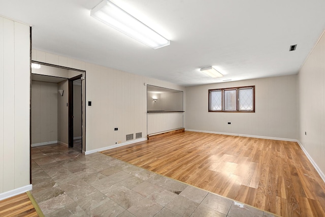 7617 Sycamore Dr, Orland Park, IL 60462 - unfurnished room featuring baseboards and light wood-style flooring