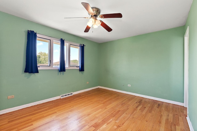 7617 Sycamore Dr, Orland Park, IL 60462 - spare room with light wood-style flooring and ceiling fan