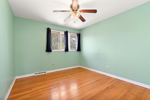 7617 Sycamore Dr, Orland Park, IL 60462 - unfurnished room with wood finished floors and ceiling fan