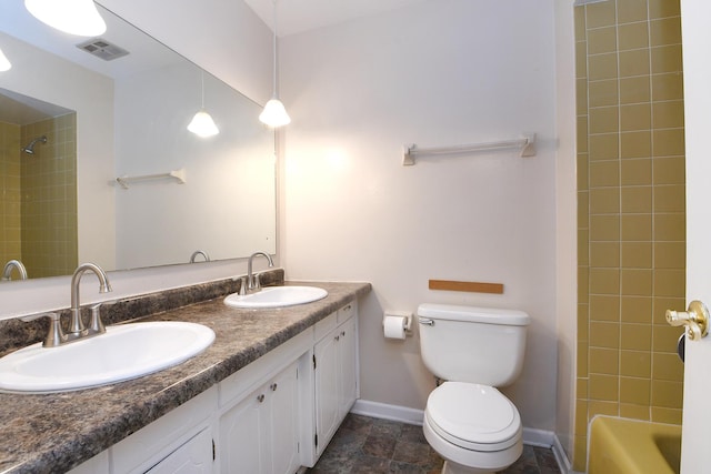 7617 Sycamore Dr, Orland Park, IL 60462 - bathroom featuring double vanity, bathing tub / shower combination, and stone finish flooring