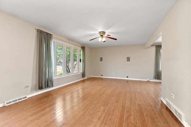 7617 Sycamore Dr, Orland Park, IL 60462 - spare room featuring a ceiling fan and light wood-style flooring