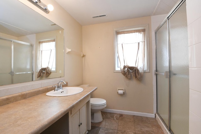 7617 Sycamore Dr, Orland Park, IL 60462 - bathroom featuring vanity, plenty of natural light, and a stall shower