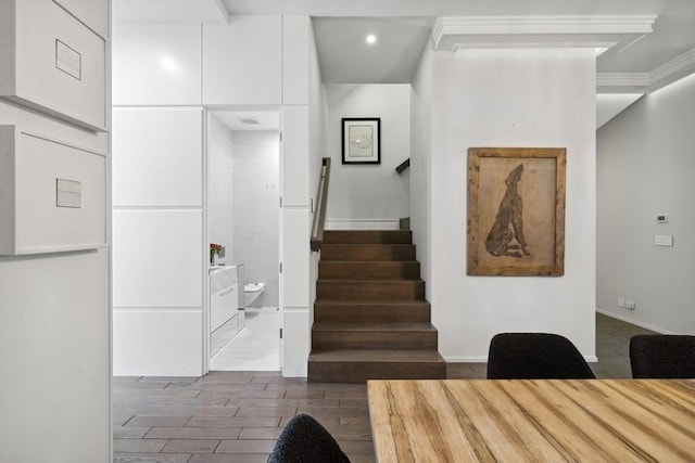 34 E Bellevue Pl, Chicago, IL 60611 - stairs featuring recessed lighting, wood finished floors, and ornamental molding
