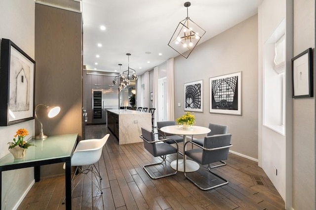 34 E Bellevue Pl, Chicago, IL 60611 - dining area featuring a chandelier, dark wood finished floors, and recessed lighting