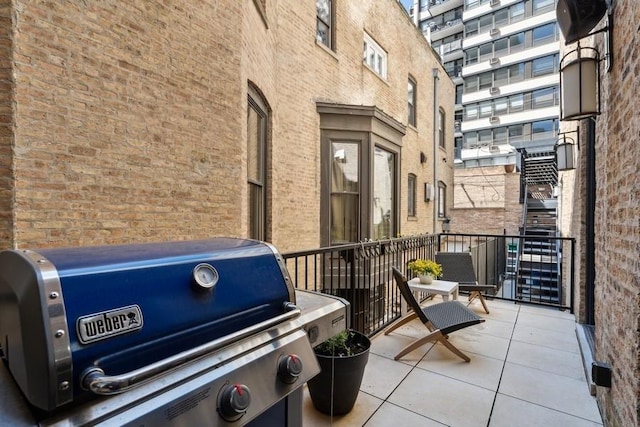 34 E Bellevue Pl, Chicago, IL 60611 - patio / terrace with a grill