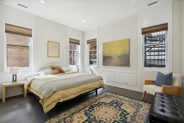 34 E Bellevue Pl, Chicago, IL 60611 - bedroom with dark wood-type flooring and recessed lighting
