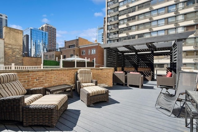 34 E Bellevue Pl, Chicago, IL 60611 - deck featuring outdoor lounge area, a view of city, and a pergola