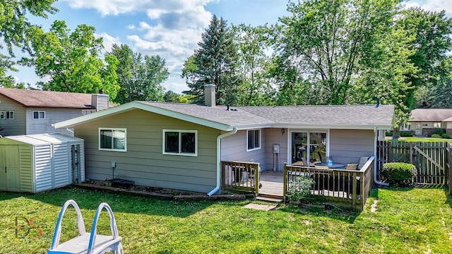 1410 James Ct, Ottawa, IL 61350 - rear view of property with a storage unit, a wooden deck, and a chimney
