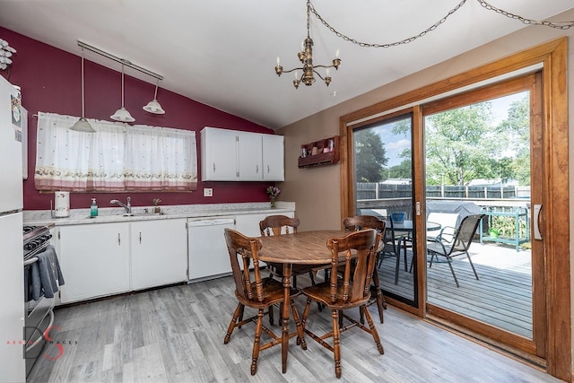 1410 James Ct, Ottawa, IL 61350 - dining area with lofted ceiling, light wood-style flooring, and a chandelier