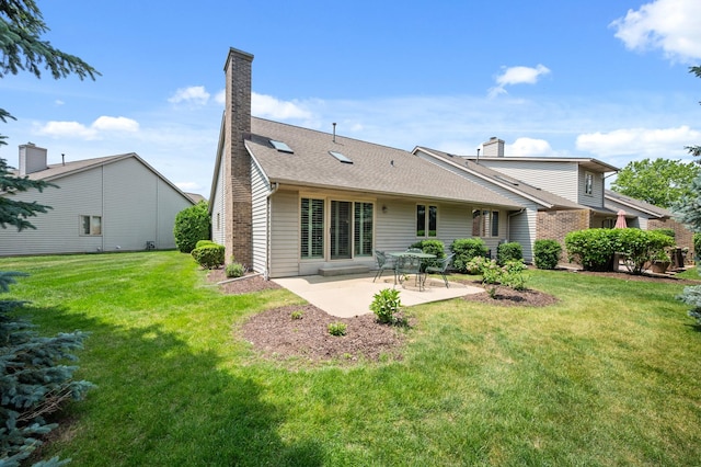814 Croatian Ct, Sycamore, IL 60178 - rear view of property with a patio area, a chimney, a yard, and a shingled roof