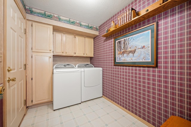 814 Croatian Ct, Sycamore, IL 60178 - laundry room with independent washer and dryer, cabinet space, wallpapered walls, light flooring, and a textured ceiling