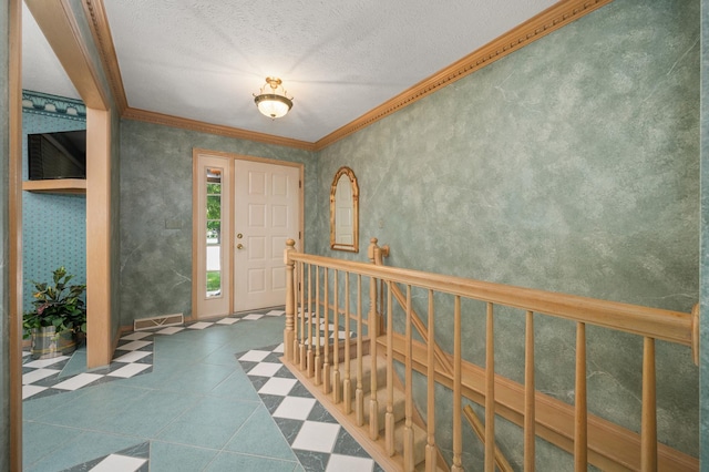 814 Croatian Ct, Sycamore, IL 60178 - tiled foyer entrance featuring ornamental molding and a textured ceiling