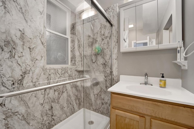 643 W Roscoe St Unit C1, Chicago, IL 60657 - full bathroom featuring a marble finish shower and vanity