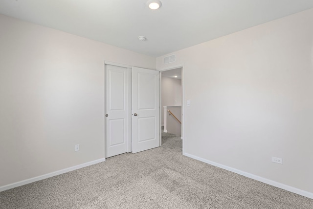 319 Brickyard Ct, Joliet, IL 60436 - unfurnished bedroom with light colored carpet and a closet