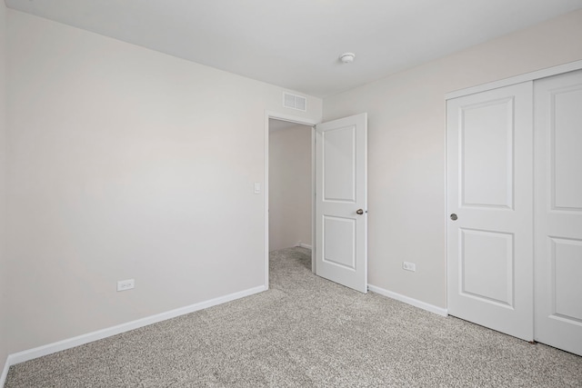 319 Brickyard Ct, Joliet, IL 60436 - unfurnished bedroom with light colored carpet and a closet