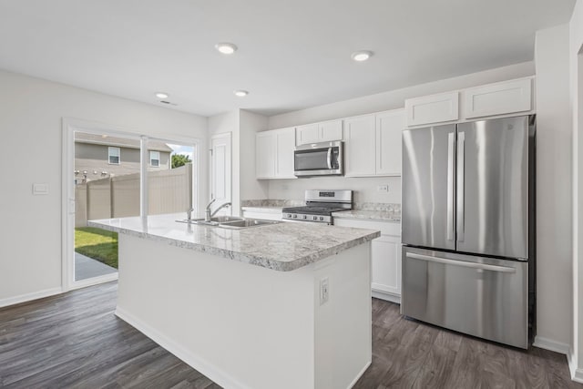 319 Brickyard Ct, Joliet, IL 60436 - kitchen with appliances with stainless steel finishes, white cabinetry, light countertops, dark wood-style flooring, and recessed lighting